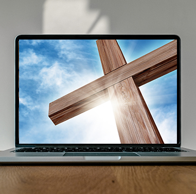 Cross on laptop screen